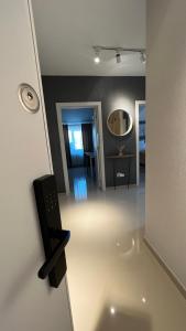 a view of a room with a mirror at Complex Rediu 54 Luxury Apartaments in Iaşi