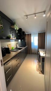 A cozinha ou cozinha compacta de Complex Rediu 54 Luxury Apartaments