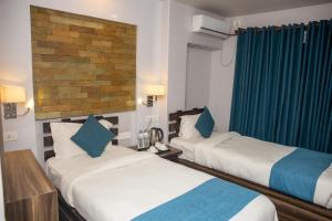 Postel nebo postele na pokoji v ubytování Chautari Boutique Hotel