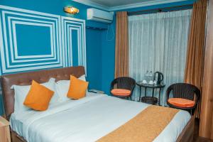 Postel nebo postele na pokoji v ubytování Chautari Boutique Hotel