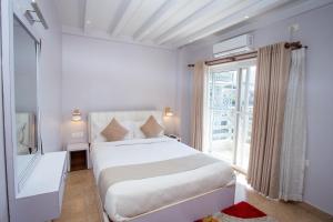 Postel nebo postele na pokoji v ubytování Chautari Boutique Hotel