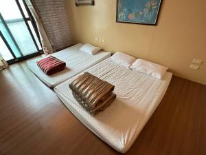 Cama o camas de una habitación en Tou Cheng Whale Watching Homestay