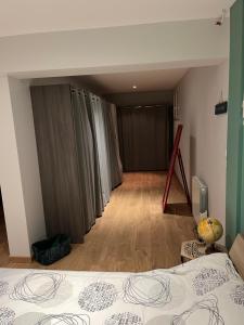Postel nebo postele na pokoji v ubytování chambre où suite privative accès indépendant