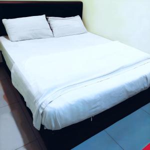 Postel nebo postele na pokoji v ubytování Hotel Lean Fatt