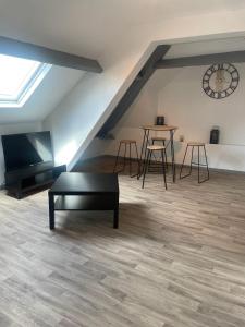 Posezení v ubytování Superbe loft neuf - 1 chambre- face au Château + 9 fotografií