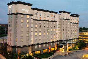 a rendering of a hotel building with a street at Homewood Suites by Hilton St. Louis - Galleria in Richmond Heights