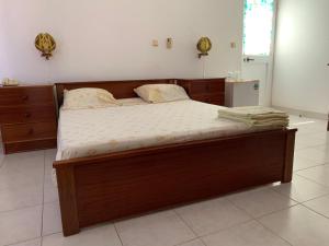 Uma cama ou camas num quarto em Residencial Pôr do Sol