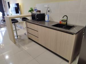 Rizky D'Bali Homestay @ Bali Residents Melaka tesisinde mutfak veya mini mutfak