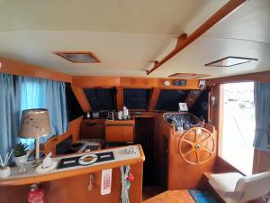 an interior view of a kitchen in an rv at Bateau Atypique Yacht La Rochelle in La Rochelle