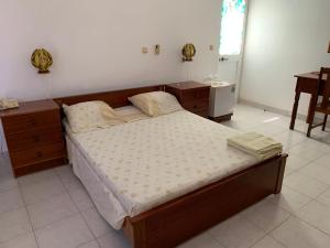 Uma cama ou camas num quarto em Residencial Pôr do Sol