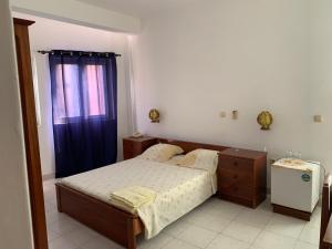 Uma cama ou camas num quarto em Residencial Pôr do Sol