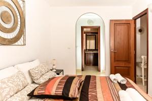 Postel nebo postele na pokoji v ubytování Cozy 2 Bedroom Apartment in Costa Adeje
