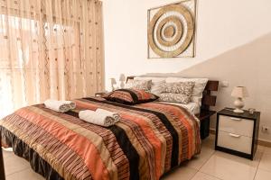 Postel nebo postele na pokoji v ubytování Cozy 2 Bedroom Apartment in Costa Adeje