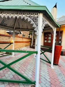 a pavilion in front of a building at Soft petal in Pretoria