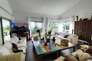 TV a/nebo společenská místnost v ubytování Villa Corbara