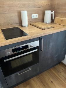 Kuchyň nebo kuchyňský kout v ubytování fichtel.flat + 8 fotografií