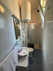 Koupelna v ubytování Apartments Palinić