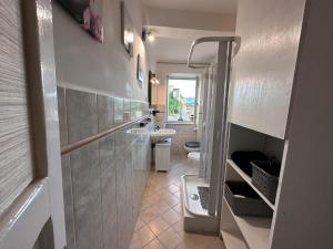 Koupelna v ubytování Vicolo Santa Maria- Appartamento nel centro storico.