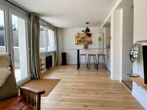 Posedenie v ubytovaní Le BeachHaus - Appartement avec Jardin a 100m de la Mer