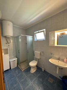 Koupelna v ubytování Apartments Palinić + 37 fotografií