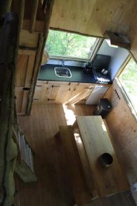 an overhead view of the inside of a tiny house at Boomhut in Voorthuizen