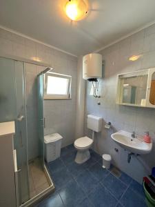 Koupelna v ubytování Apartments Palinić
