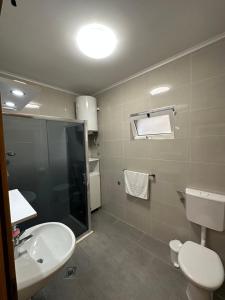 Koupelna v ubytování Apartments Palinić