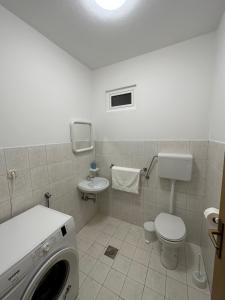 Koupelna v ubytování Apartments Palinić