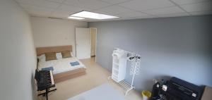 a hospital room with a bed and a television at Sunset de Luz in Nijmegen +15 photos