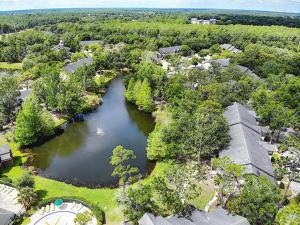 an aerial view of a lake in a subdivision at Stunning Tree Tops Apt - Disney! in Kissimmee