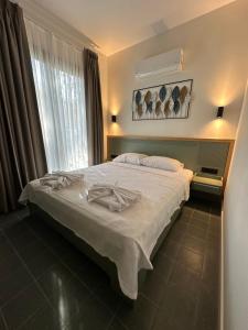 Кровать или кровати в номере Esmahan Forest and Pool by Zehra Suites