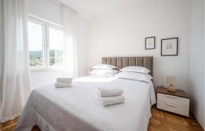 Postel nebo postele na pokoji v ubytování Two-Bedroom Apartment In Vinisce