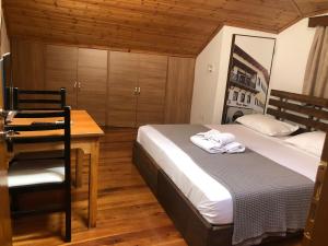 Postel nebo postele na pokoji v ubytování Hotel Demaj