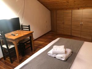 Postel nebo postele na pokoji v ubytování Hotel Demaj