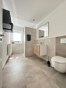 Ένα μπάνιο στο Ferienwohnung Faber