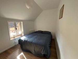 Postel nebo postele na pokoji v ubytování Maison de village