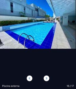 a picture of a swimming pool in a building at Flat 427, Imperial Flat Tambau NOBILE in João Pessoa