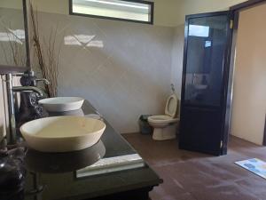 Koupelna v ubytování Melaya Beach Resort Room Double