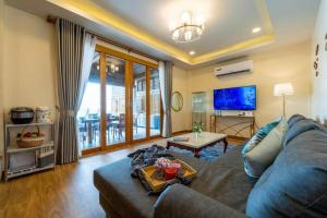 Posezení v ubytování Come Home Beach Villa, 3 Bedrooms CA3