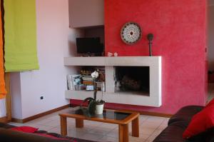 TV a/nebo společenská místnost v ubytování Liana Guest House