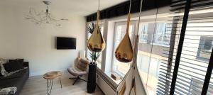 TV a/nebo společenská místnost v ubytování Centrum luxe appartement Ost 2 plus 2