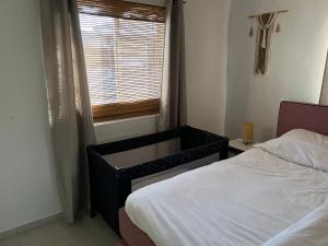 Postelja oz. postelje v sobi nastanitve Casa Juno