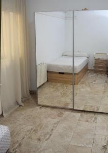 Posteľ alebo postele v izbe v ubytovaní Apartamentos Atlas Terrassa II