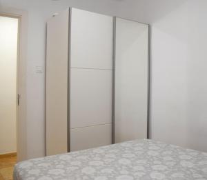 Posteľ alebo postele v izbe v ubytovaní Apartamentos Atlas Terrassa II