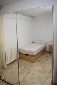 Posteľ alebo postele v izbe v ubytovaní Apartamentos Atlas Terrassa II