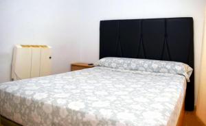 Posteľ alebo postele v izbe v ubytovaní Apartamentos Atlas Terrassa II