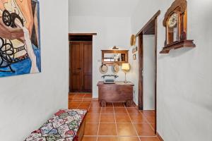 Postel nebo postele na pokoji v ubytování Finca de los Abuelos