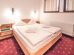 Postel nebo postele na pokoji v ubytování Hotel Andrea 3-Sterne Superior