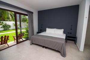 Postel nebo postele na pokoji v ubytování My Blue Hotel Holbox
