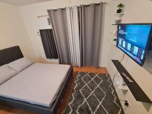 Postel nebo postele na pokoji v ubytování Cebu One Oasis Fully Furnished Studio with balcony